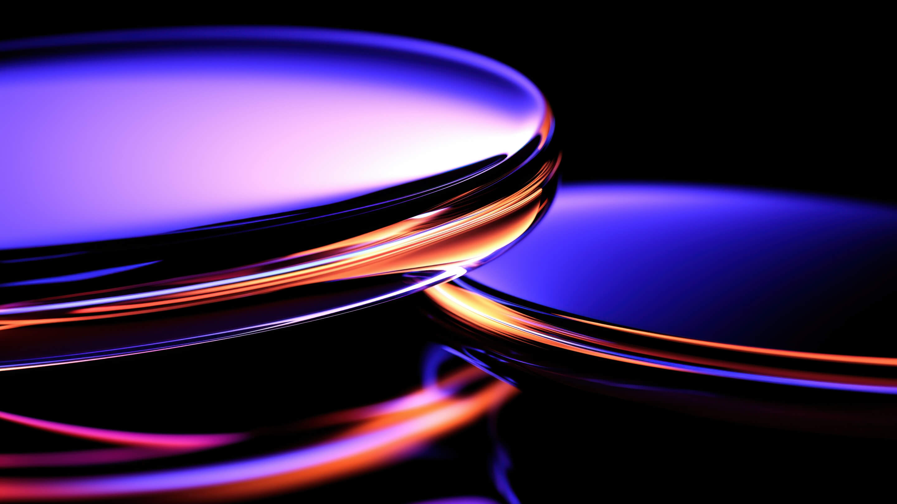 Abstract 3D render of glossy curved glass surfaces reflecting purple, orange, and blue light against black